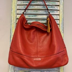 Coach red leather purse.